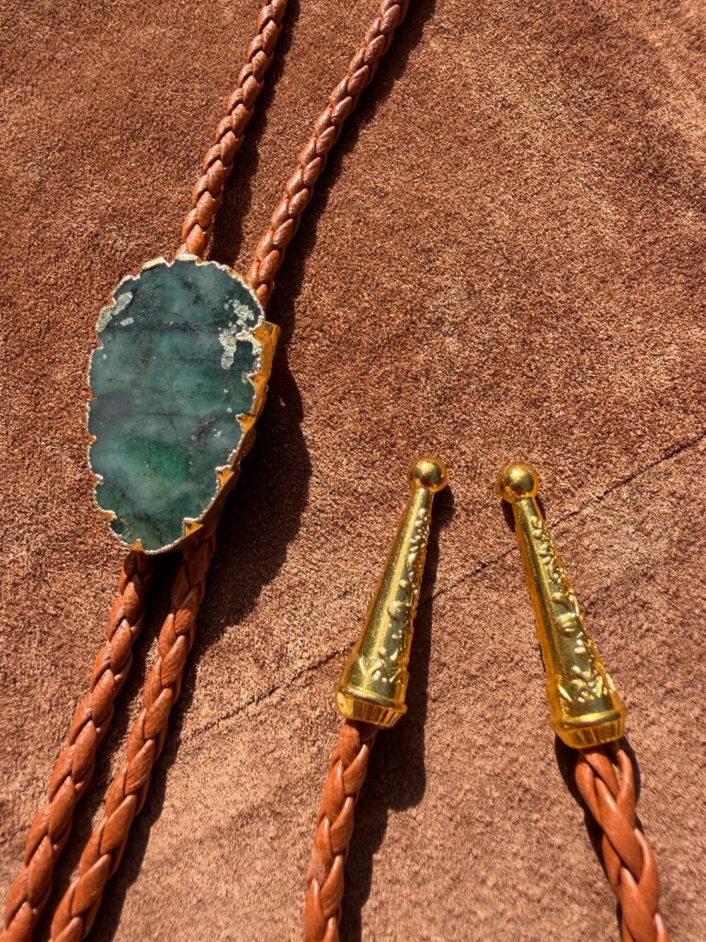 Western Bolo Tie Green Stone Slice Gold Tone Edge Brown Braided Cord